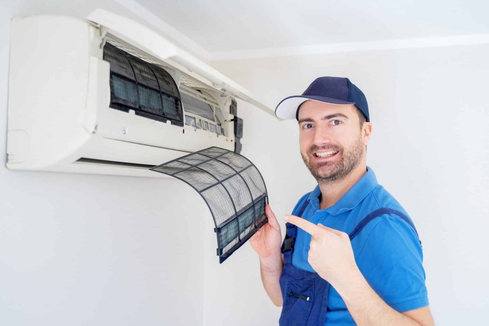 technician-cleaning-air-conditioner-filter-on-the-wall-at-home-for-picture-id1370653530