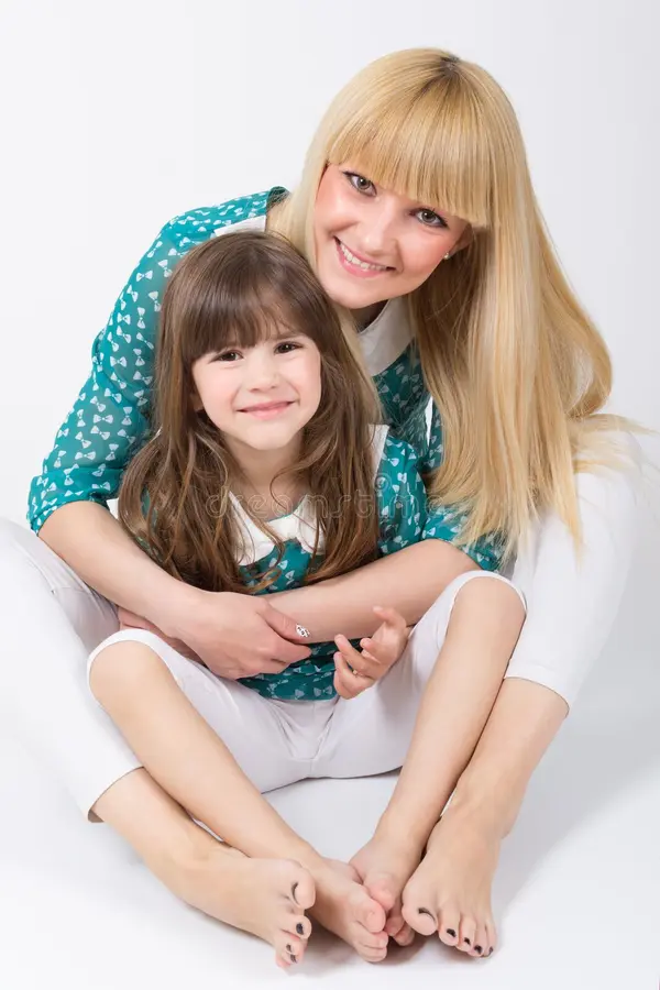 mother-daughter-long-hair-bangs-huging-smiling-cute-caucasian-blonde-brunet-similar-haircuts-hugging-wearing-40278338